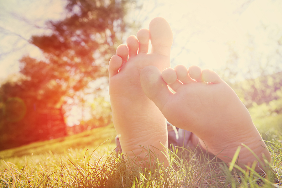 barefoot-person-on-the-grass