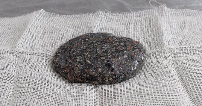 Activated charcoal poultice on cheesecloth