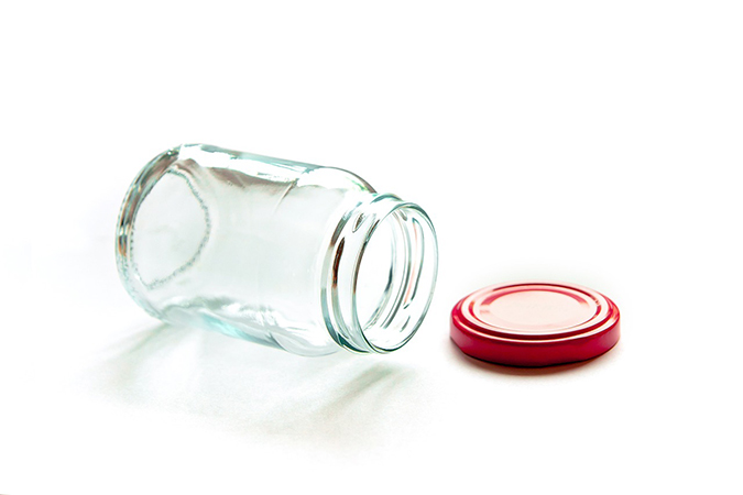 Empty glass container for storing homemade apple cider vinegar